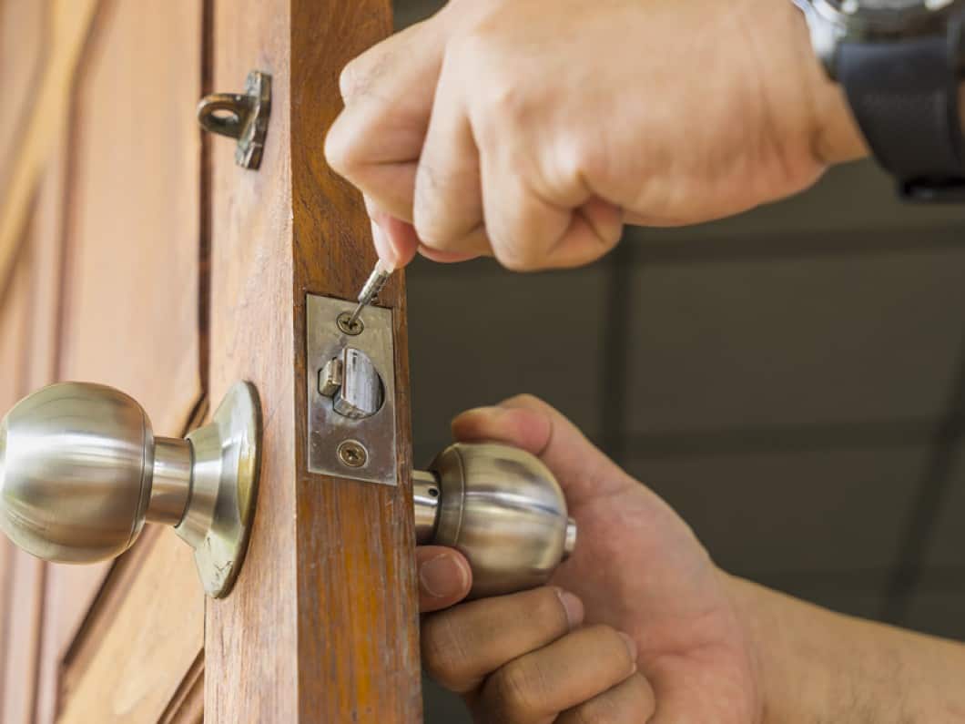 Residential Locksmith Changing Lock Image